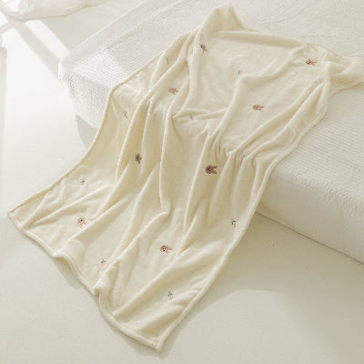 couverture bébé beige en velours avec lapins