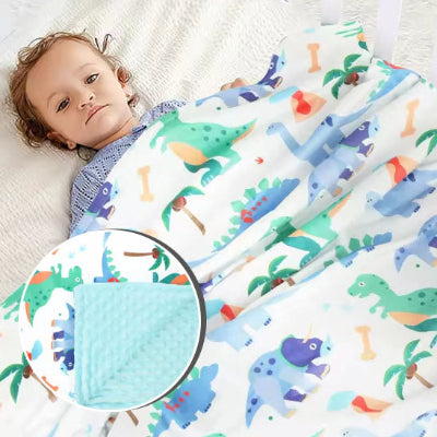 couverture bébé avec dinosaures bleu et vert