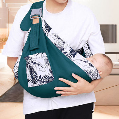 écharpe de portage verte - bébé dort bras maman