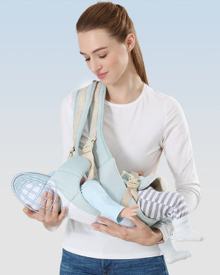 porte bébé vert glace - bébé couché