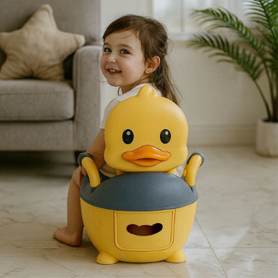 pot-bebe-canard-jaune-fille sur pot