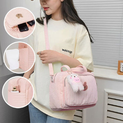 sac à langer rose porté sur épaule et détails